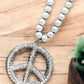 A Rare Bird - Pearl & Rhinestone Peace Sign Necklace