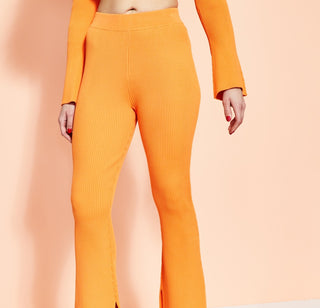 Royalty By Maluma Women's Ribbed Pants Orange