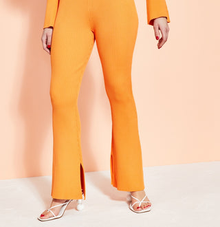 Royalty By Maluma Women's Ribbed Pants Orange