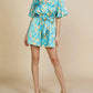 Skies Are Blue - Floral Print Surplice Romper