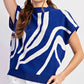 Ee:Some - Curvy Simplistic Swirl Mock Neck Top