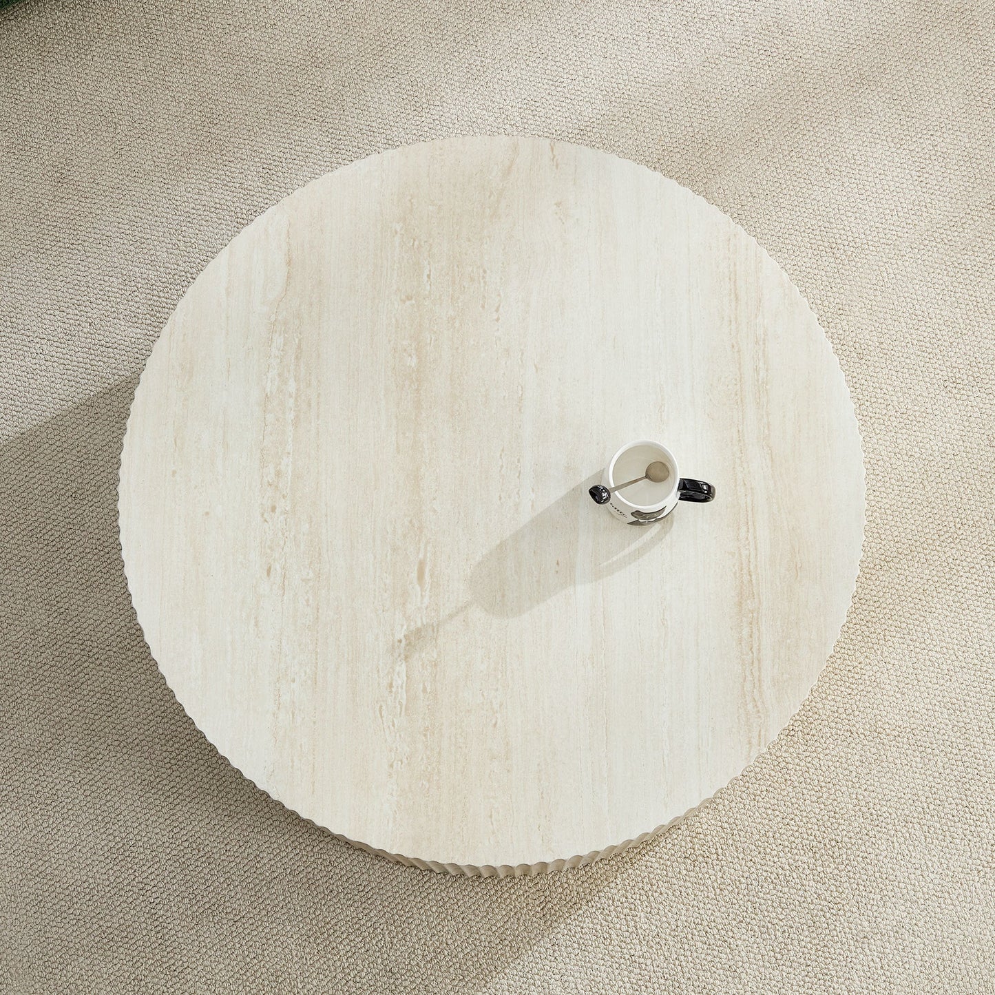 Faux Travertine Round Coffee Table with Eye-Catching Relief Design