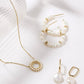 Eklexic - Women's Huggie Hoops With Pearl Drop Earrings