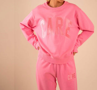 Care Tucker - 90’s Baggy Care Crewneck Sweatshirt