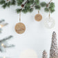 Wooden Hanging Circle With Snowflake Cut Christmas Ornaments (Set of 12)