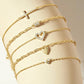Eklexic - Women's Horizontal Cubic Zirconia Cross Bracelet