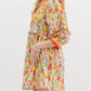 Entro - Floral Breeze Mini Dress with Ruffle Accents & Banded V-Neck Detail