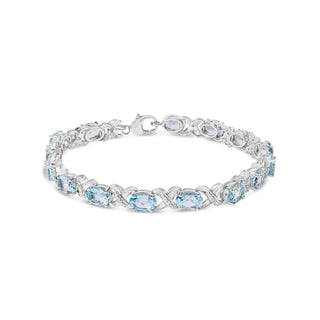 .925 Sterling Silver 16.0 Cttw Oval Blue Topaz and Diamond Accent Tennis X Link Bracelet (I-J Color, I1-I2 Clarity) - Size 7" Inch