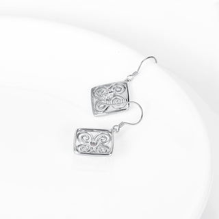 Sterling Silver and White Topaz Drop Swirl Earrings