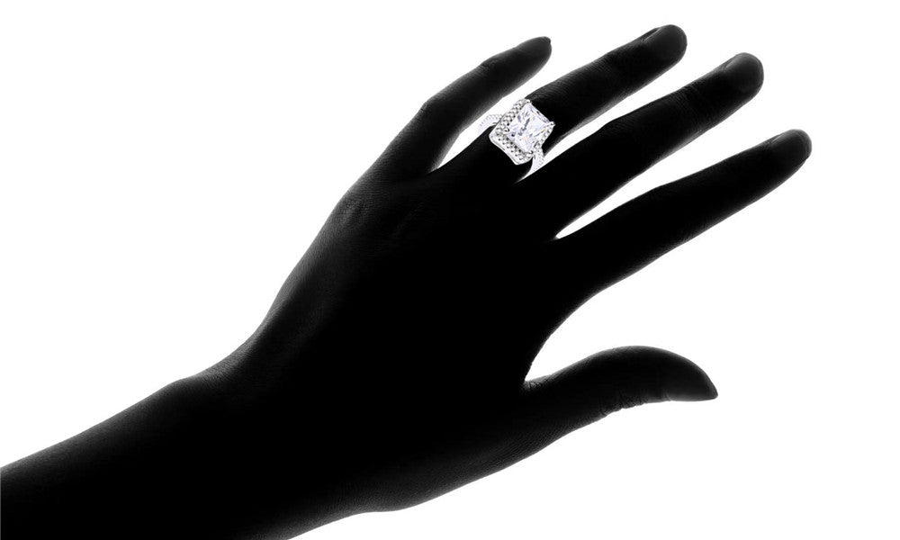 Halo Engagement Ring with Simulated Diamond in 18K White Gold