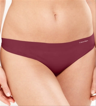 Calvin Klein Women's Invisibles Thong-Panty Rapberry Size S