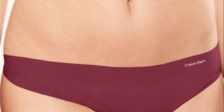 Calvin Klein Women's Invisibles Thong-Panty Rapberry Size S