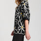 Apny - Whimsical Floral Sweater With Contrast Cuffs And Pockets