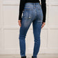 Judy Blue - Buffalo Plaid Peek-A-Boo Skinny Jeans