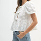 Mable - Eyelet Puff Sleeve Front Tie Peplum Top