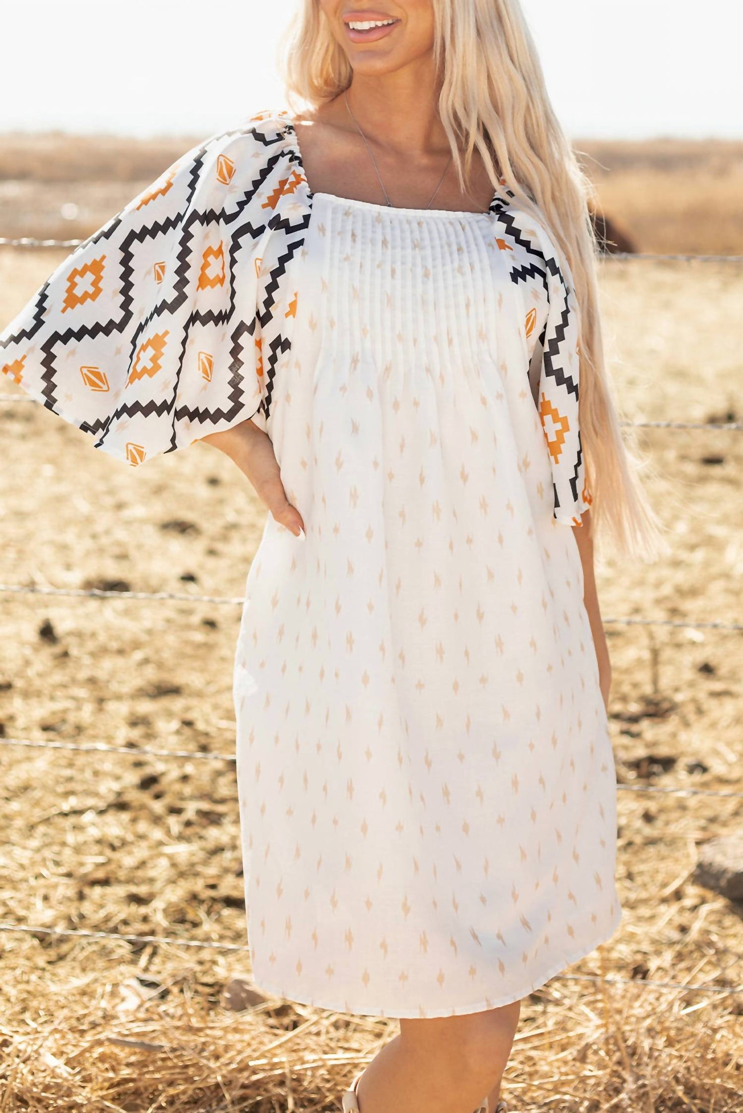 See And Be Seen - Aztec Print Pleated Square Neck Mini Dress