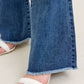 Judy Blue - Mid Rise Vintage Wash Flare Jeans With Distressed And Fray Hem