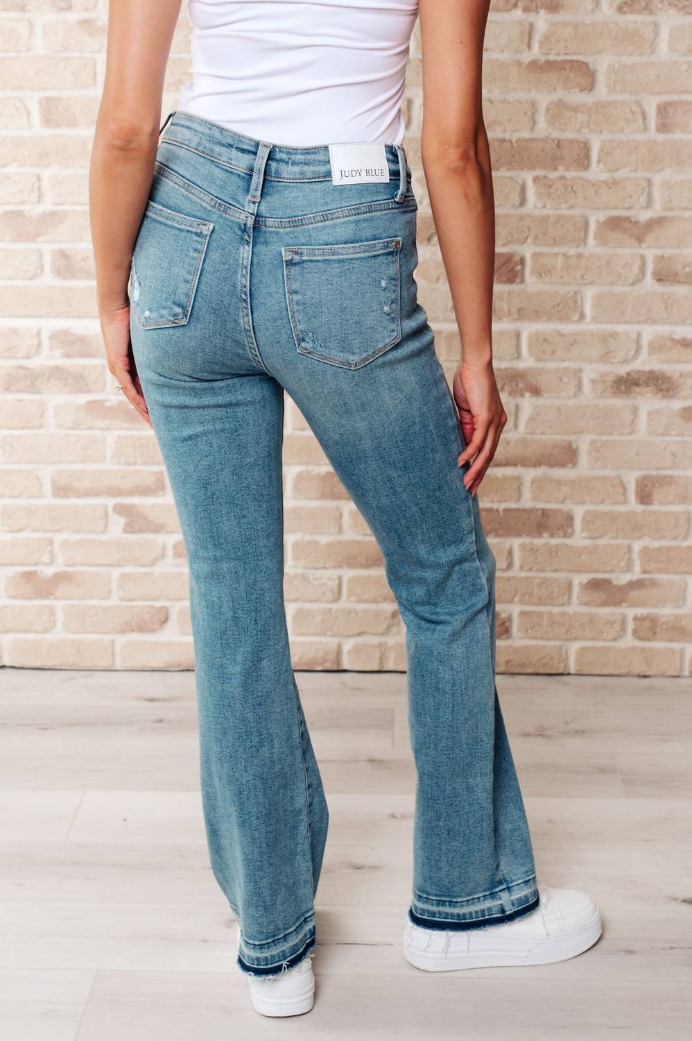 Judy Blue - Mid Rise Distressed Released Hem Bootcut Jeans