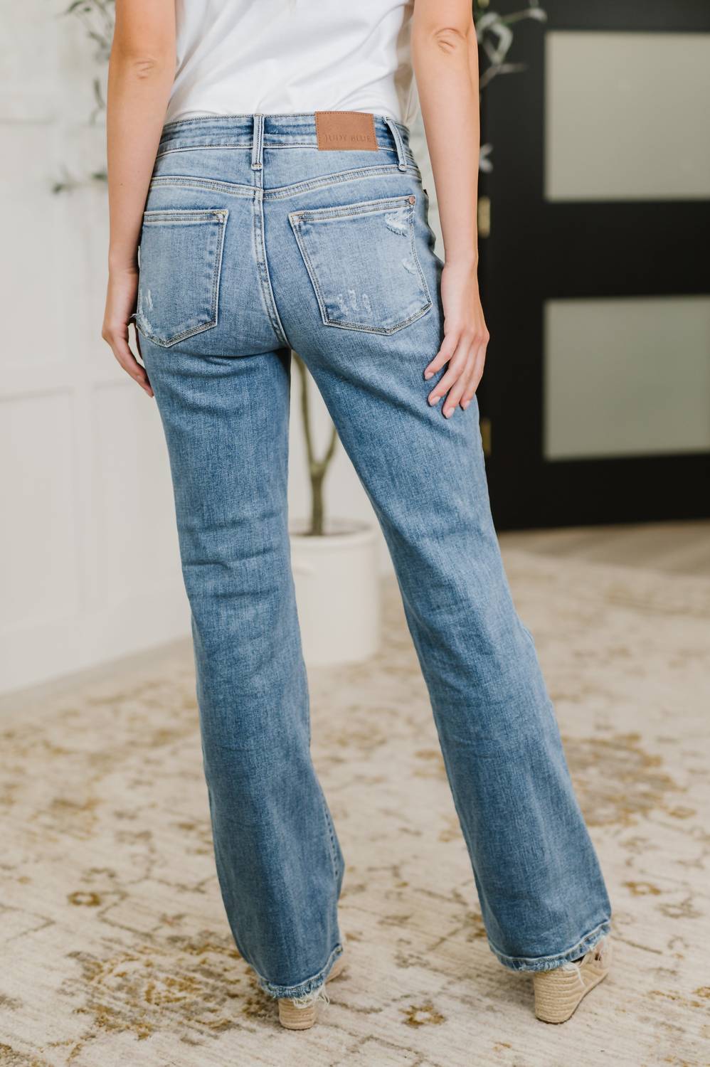 Judy Blue - Mid Rise Boot Cut Jean With Distress Hem
