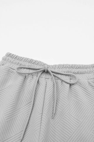 Aapparella - Textured T-shirt And Pant Set