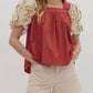 Entro - brick blouse with white ruffle
