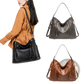 Leather Hobo Bag with Tassel and Front Zipper Pockets